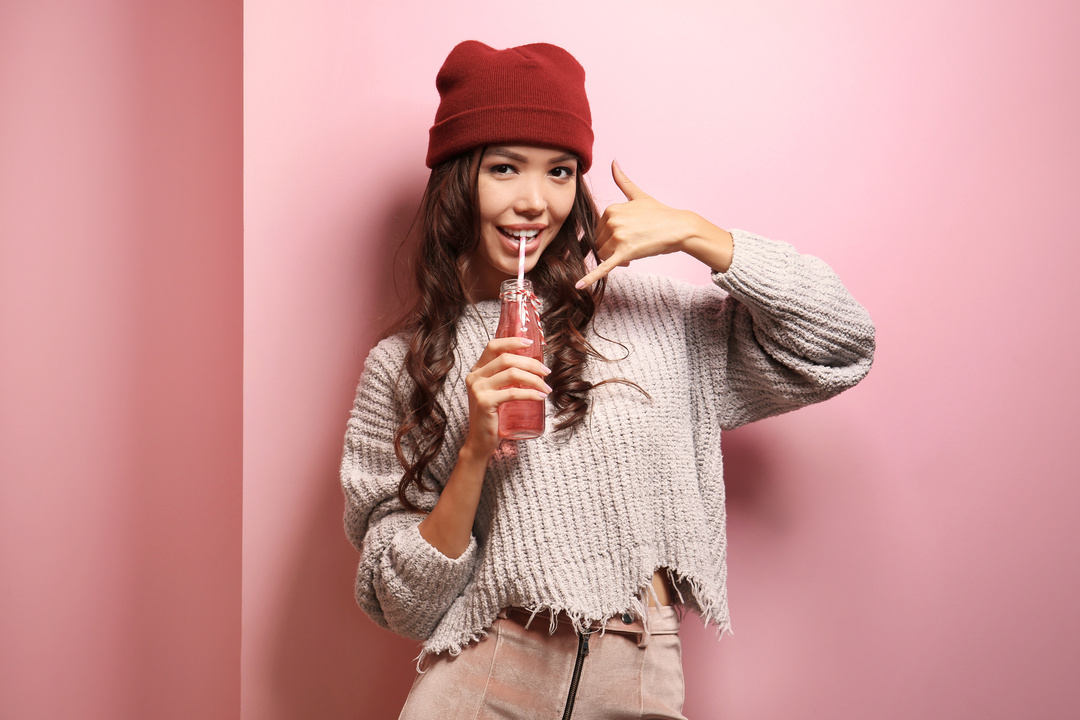 Beautiful Hipster Girl on Pink Background